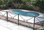 Lush landscaping and pool fountains